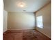 Simple bedroom with carpet, natural light, and neutral paint, perfect for customization at 1291 Vienna Ct, Hampton, GA 30228