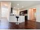 Kitchen with granite countertops and a bar at 1291 Vienna Ct, Hampton, GA 30228