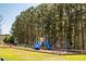 Community playground featuring slides, climbing structures, and swings, perfect for Gathering fun at 1291 Vienna Ct, Hampton, GA 30228