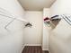 Walk-in closet has wire shelving and wood floor providing ample storage space at 1291 Vienna Ct, Hampton, GA 30228