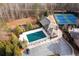 A community pool and tennis court are shown from above at 230 Society St, Alpharetta, GA 30022