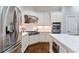 Modern kitchen with stainless steel appliances, granite countertops, and ample cabinet space at 230 Society St, Alpharetta, GA 30022