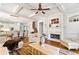 Comfortable living room with a fireplace, hardwood floors, and an open layout connected to the kitchen at 230 Society St, Alpharetta, GA 30022