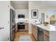 Bright kitchen boasts stainless steel appliances, stone countertops, and wood flooring at 384 Ralph Mcgill Ne Blvd # 314, Atlanta, GA 30312