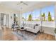 Bright living room with large windows, hardwood floors, and modern furniture at 384 Ralph Mcgill Ne Blvd # 314, Atlanta, GA 30312