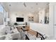 Bright living room with kitchen view, hardwood floors, and modern furniture at 384 Ralph Mcgill Ne Blvd # 314, Atlanta, GA 30312