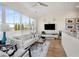 Bright living room with large windows, hardwood floors, and modern furniture at 384 Ralph Mcgill Ne Blvd # 314, Atlanta, GA 30312