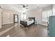 Bedroom with hardwood floors, a modern design, and good lighting at 1591 Alder Se Ct, Atlanta, GA 30317