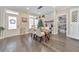 Dining room with modern chandelier, Christmas tree, and a view into the pantry at 1591 Alder Se Ct, Atlanta, GA 30317