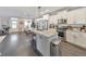 Modern kitchen with stainless steel appliances, granite countertops, and a breakfast bar at 1591 Alder Se Ct, Atlanta, GA 30317