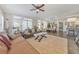 Spacious open-concept living room with hardwood floors and plenty of natural light at 1591 Alder Se Ct, Atlanta, GA 30317