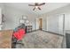 Bright home office with dark wood floors, a ceiling fan, and ample space for storage at 1591 Alder Se Ct, Atlanta, GA 30317