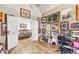 Bonus room featuring hardwood floors, vaulted ceiling, and french doors leading into the Dining Room at 2557 Sixes Rd, Canton, GA 30114