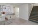 Finished basement area with stylish wet bar and staircase providing a clean, open space at 2569 Woodhill Ln, Atlanta, GA 30344