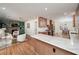 Inviting living room with a cozy fireplace, built-in shelving, and an open connection to the kitchen at 2569 Woodhill Ln, Atlanta, GA 30344