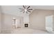 Bright living room with vaulted ceiling, fireplace, and seamless flow to the hallway and kitchen at 6491 Stonelake Sw Pl, Atlanta, GA 30331