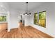 Hardwood floors and natural lighting accentuate the open concept dining room at 891 Thurmond Nw St, Atlanta, GA 30314