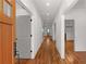 Bright hallway showcasing hardwood floors and modern doors, offering a glimpse into the home's layout at 891 Thurmond Nw St, Atlanta, GA 30314