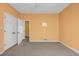 Bright bedroom with double doors and neutral carpet at 1450 Brandy Shoals Se Dr, Conyers, GA 30013