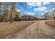 Charming single story home with a long driveway and brick facade at 1450 Brandy Shoals Se Dr, Conyers, GA 30013