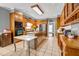Traditional kitchen featuring wooden cabinets, stainless steel appliances, and a large island at 1450 Brandy Shoals Se Dr, Conyers, GA 30013
