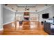 Spacious living room with hardwood floors, high ceilings, a fireplace, and large sliding glass doors at 1450 Brandy Shoals Se Dr, Conyers, GA 30013