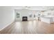 Spacious living room features bright, neutral walls and wood-look floors at 2025 Wyndham Pl, Conyers, GA 30013
