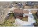 An aerial view of the backyard, back deck, and driveway of the property at 4837 Mystere Cir, Lilburn, GA 30047
