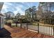 Beautiful wood deck overlooking the spacious backyard and surrounding trees at 4837 Mystere Cir, Lilburn, GA 30047
