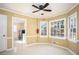 Cozy breakfast nook with natural light, ceiling fan, and access to laundry room at 4837 Mystere Cir, Lilburn, GA 30047