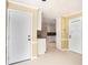 Entry foyer with tile floors, neutral walls and an opening to the gourmet kitchen at 4837 Mystere Cir, Lilburn, GA 30047