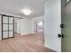 Inviting entryway with modern sliding door, beautiful hardwood floors, and a view into the bright, updated kitchen at , Atlanta, GA 30329