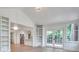 Bright living room featuring a vaulted ceiling, hardwood floors, and built-in shelves at , Atlanta, GA 30329