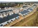 An aerial view of the community showcasing the well-maintained townhomes and landscaping at 1120 Sunny Lake Dr, Lawrenceville, GA 30043