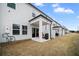 Back patio with privacy fence and outdoor air conditioning unit at 1120 Sunny Lake Dr, Lawrenceville, GA 30043