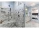 Modern marble tiled shower stall featuring dual shower heads and a seat at 2109 Rugby Ave, Atlanta, GA 30337