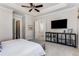 Calm bedroom showcasing tray ceilings, ceiling fan and furniture at 2109 Rugby St, Atlanta, GA 30309