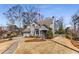 Well-manicured lawn and walkway to the front door enhance the curb appeal of this inviting home at 2109 Rugby Ave, Atlanta, GA 30337