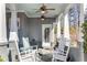 Inviting front porch with rocking chairs and decorative ceiling fans at 2109 Rugby St, Atlanta, GA 30309