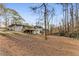 Expansive backyard featuring a wooden deck on a charming two-story home, ideal for outdoor entertaining at 2490 Brookcliff Ne Way, Atlanta, GA 30345