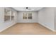 Bright, empty bedroom with hardwood floors, neutral paint, and a ceiling fan at 2490 Brookcliff Ne Way, Atlanta, GA 30345