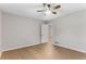 This neutral bedroom offers hardwood floors, a ceiling fan, and ample closet space at 2490 Brookcliff Ne Way, Atlanta, GA 30345