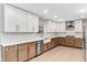 Modern kitchen featuring two-tone cabinetry, stainless steel appliances, and a subway tile backsplash at 2490 Brookcliff Ne Way, Atlanta, GA 30345