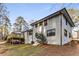 The rear exterior of the home features a large deck, and a brick exterior at 2490 Brookcliff Ne Way, Atlanta, GA 30345