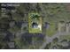 Aerial view of the property, highlighting lot size and surrounding neighborhood in Stone Mountain, GA at 557 Old Friar Tuck Ln, Stone Mountain, GA 30087