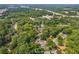 This aerial view captures the home's location near a green suburban area and a major highway at 2825 3Rd Sw Ave, Atlanta, GA 30315