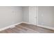 Cozy bedroom featuring hardwood floors, and neutral paint at 2825 3Rd Sw Ave, Atlanta, GA 30315