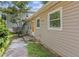 Exterior view of the home with a cozy side area and small yard space featuring a grill at 2825 3Rd Sw Ave, Atlanta, GA 30315