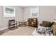 Bright living room with hardwood floors, a large window, and a quaint accent table at 2825 3Rd Sw Ave, Atlanta, GA 30315