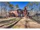 Large backyard with a patio, pergola, and expansive lawn at 155 Matthew Way, Fayetteville, GA 30214